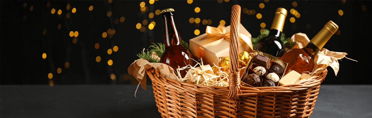 Kosze prezentowe z alkoholem i słodyczami